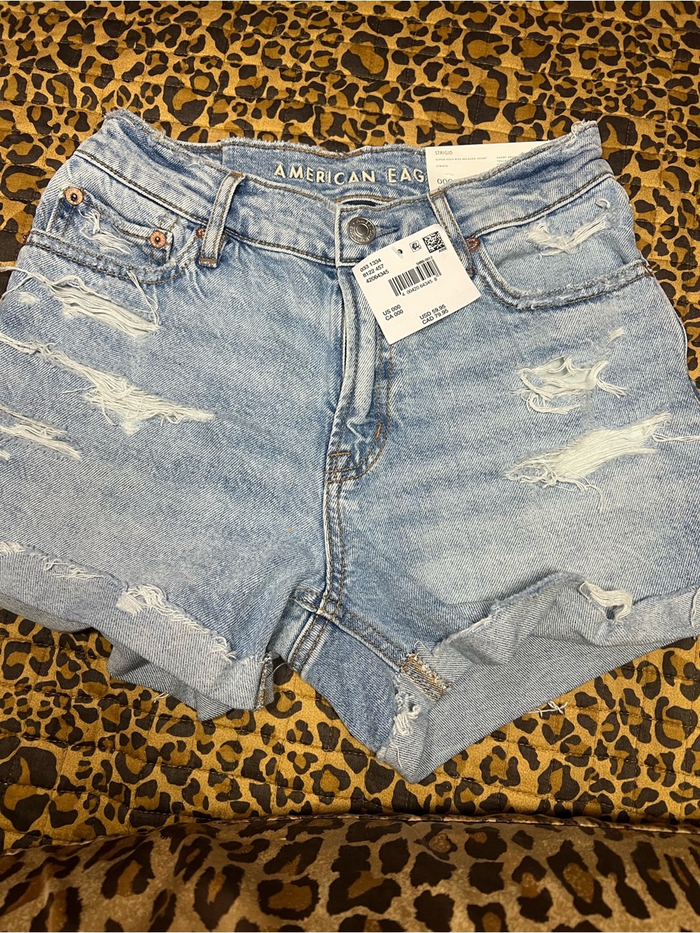 American Eagle Strigid Ripped Relaxed Denim Shorts 000/23W